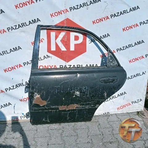 Mazda 626 sol arka kapı Tla-0087